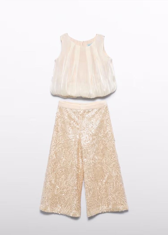 Compl. pant. lungo e lustrini